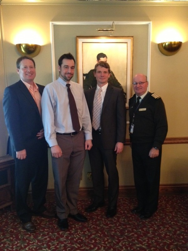 Gathering at the January meeting are (l-r) Norman LeCouvie, Microsoft (lunch sponsor); Beaudoin; John Hewie, Microsoft; and Col. Girard.